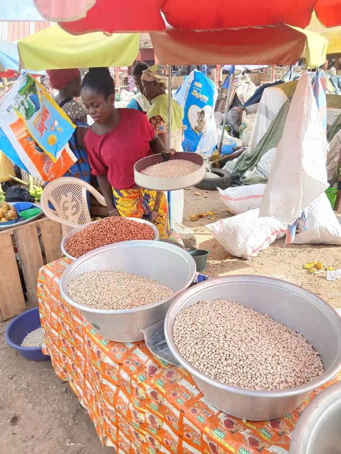 Sifting gari by hand